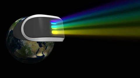 Planet earth with a virtual reality helmet radiating rainbow light Stock Footage 102432560