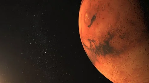 Planet Mars. View from space. Mars rotates slowly. The planet is illuminated by Stock Footage 99251220