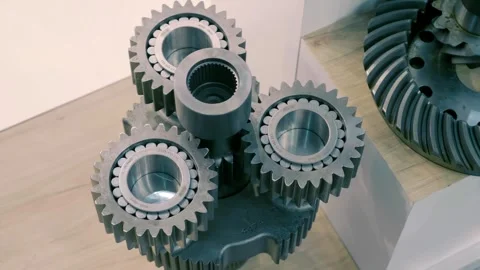 Planetary gearboxes consisting of several gears on bearings in the exhibition Stock-Footage 333325983