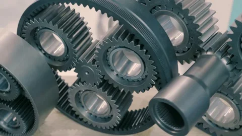 Planetary gearboxes consisting of several gears on bearings in the exhibition Stock Footage 333347563