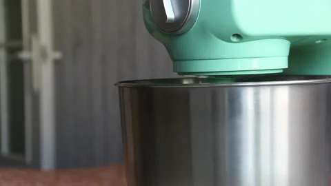The planetary mixer is running. Makes meringue for making a cake. Cooking cak Stock Footage 210797812