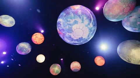 Planets of the solar system decorated with light hangs from the ceiling Stock Footage 260718104
