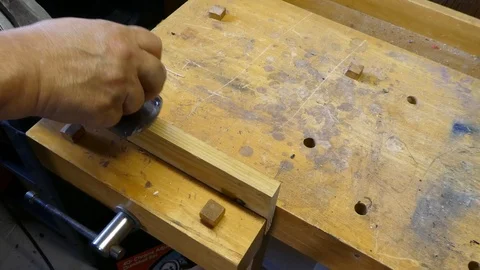 Planing an edge with a hand plane Stock Footage 107333012