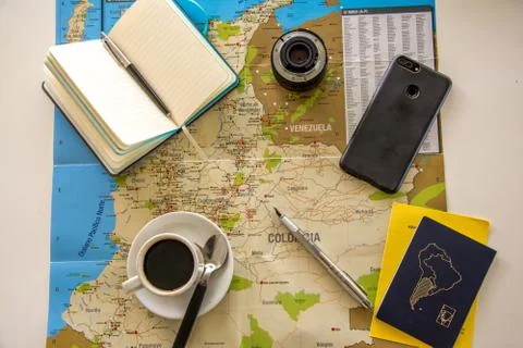 Planing vacation with map, notepad, coffee and passport Stock Photos