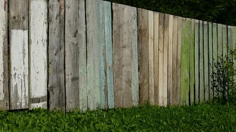 Plank fence with peeling paint of different colors Stock-Footage 116984883