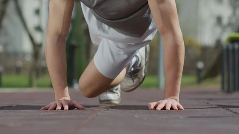 Plank with knee to elbow Stock Footage 100029021
