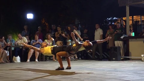 Plank performance of a couple of acrobatic dancers Stock Footage 85216102