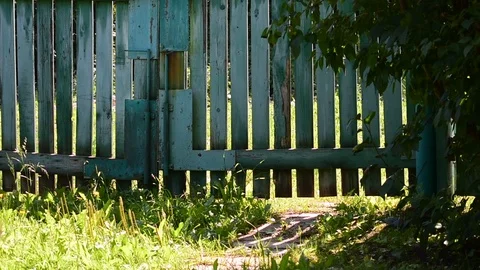 Planked gate backlit Stock Footage 116984509