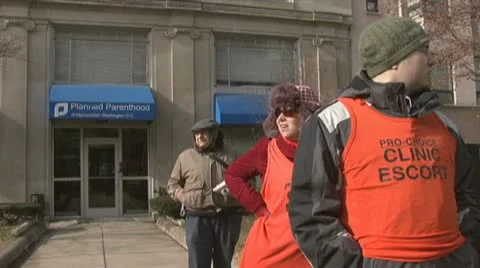 Planned Parenthood Guards Stock Footage 12450153