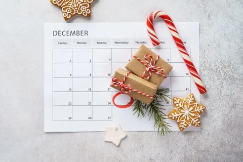 Planner page with Christmas gift boxes, cookies and decoration. Stock Photos