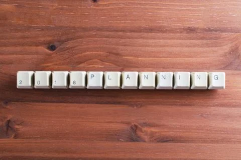 Planning 2018 new year on computer keyboard keys buttons on wooden background Foto stock
