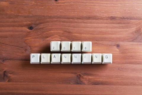 Planning 2018 new year on computer keyboard keys buttons on wooden background Foto stock