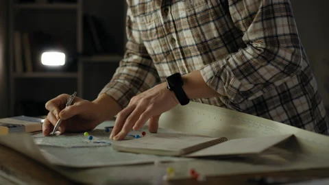 Planning and organizing tasks using notes and colorful markers on a table Stock Footage 304270576