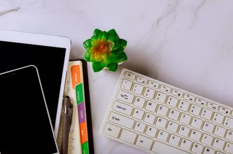 Planning concepts pen on notebook weekly calendar with smartphone and compute 스톡 사진