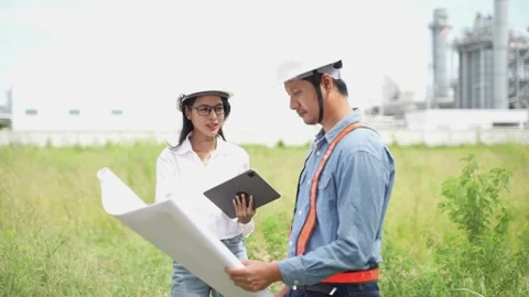 Planning engineering and project leader working and check Plans at Industrial Stock Footage 279505149