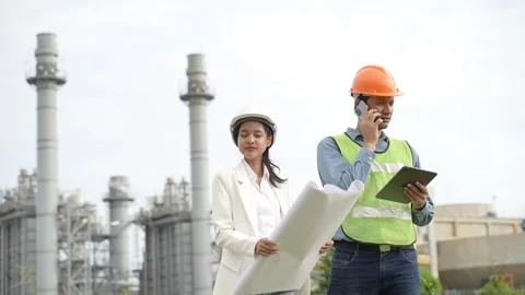 Planning engineering and project leader working and check Plans at Industrial Si Stock Footage 279505288