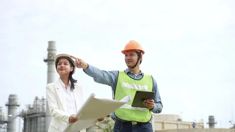 Planning engineering and project leader working and check Plans at Industrial Si Stock Footage 279505293