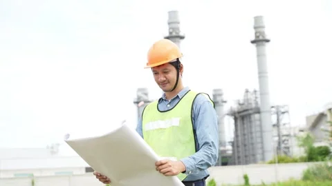 Planning engineering check  drawing and Plans on Construction Site at Industrial 動画素材 279505236