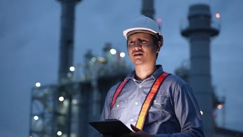 Planning engineering  with Hard Hat using digital tablet working at Industrial 動画素材 279505381