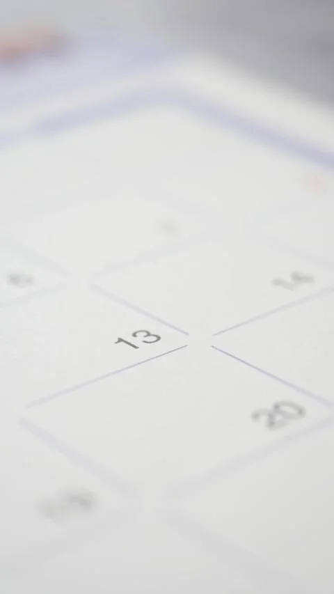 Planning for important dates on a calendar page Stock Footage 340862743