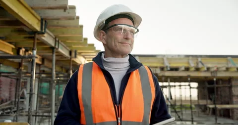 Planning, man and construction worker on site with ideas for inspection on Stock Footage 342746652