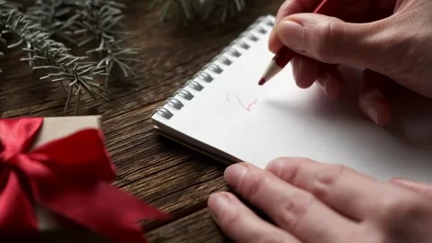 Planning for the new year 2022. Hands of young woman Video stock 167927155
