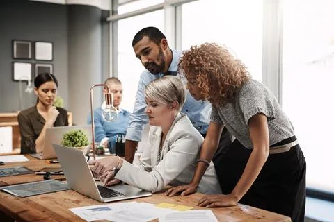 Planning is only the first step. Shot of a group of businesspeople working 스톡 사진