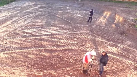 Planning of path and track on countryside land plot with marking rope and pegs Stock Footage 80820458