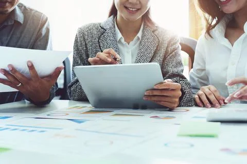 Planning to reduce investment risks, the image of a group of businesspeople Stock Photos