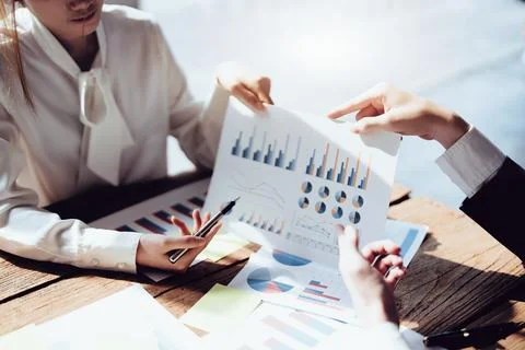 Planning to reduce investment risks, the image of a group of businesspeople Stock Photos