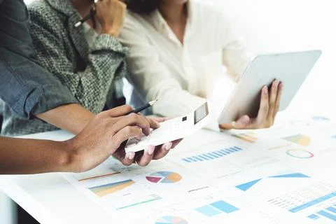 Planning to reduce investment risks, the image of a group of businesspeople Stock Photos