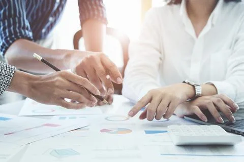 Planning to reduce investment risks, the image of a group of businesspeople Stock Photos