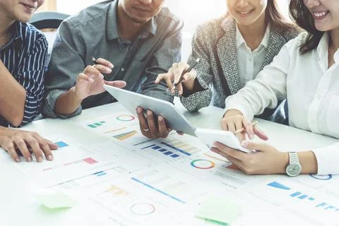 Planning to reduce investment risks, the image of a group of businesspeople Stock Photos