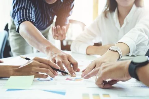 Planning to reduce investment risks, the image of a group of businesspeople Stock Photos