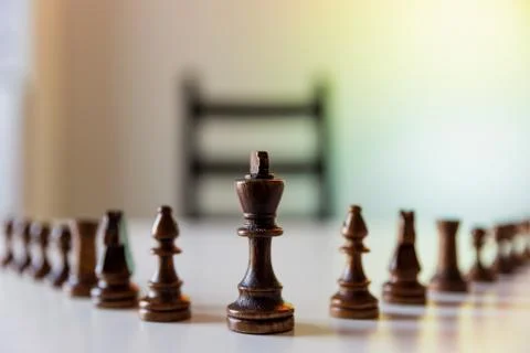Planning strategy with chess figures on table. Strategy, leadership and teamw Stock Photos