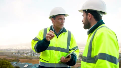 Planning, team and architect with discussion at construction site, engineering Stock Footage 336201296