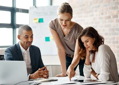 Planning, team and documents in office for meeting, project brief or client.. Stock Photos