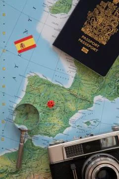 Planning a trip to Spain with a world map and accessories. 写真素材
