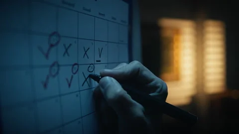 Planning Using Calendar in the night Video stock 239750728