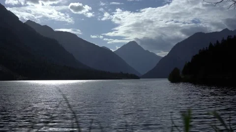 Plansee view with cloudy blue sky in austria Video stock 222932275