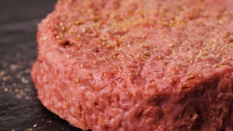 Plant based vegan burger meat, fake vegeterian beef meat close up, fresh Stock Footage 120867136