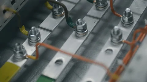 Plant electrician builder engineers at work installing cable with wrench spanner Stock Footage 57522479