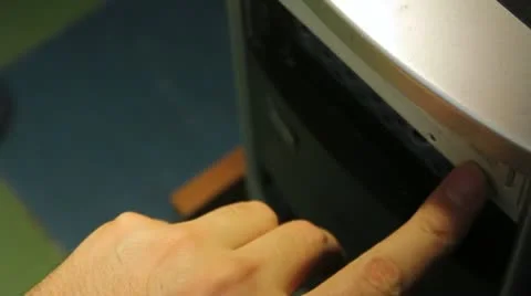 Plant extract CD to your computer Stock Footage 14808655