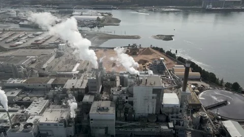 Plant Next To Harbor Proccessing Raw Goods For the Supply chain Stock-Footage 184979977