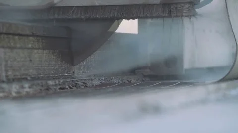Plant for the production of concrete, cutting machine cuts the concrete slab. Stock Footage