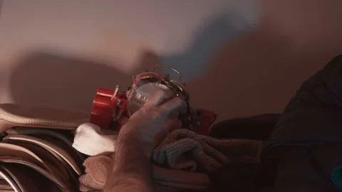 Planting a bomb inside a closet Stock Footage 144872771
