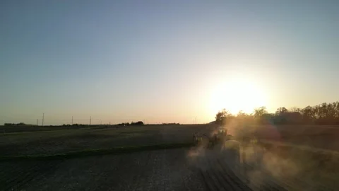 Planting crops at sunset Stock Footage 300195353