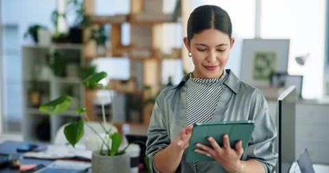 Plants, schedule and tablet with business woman in green office for net zero Stock Footage 321114386