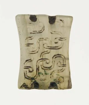 Plaque with Interlinked Scrolls 700 BCE 600 BCE China. Jade . Copyright: x... Stock Photos