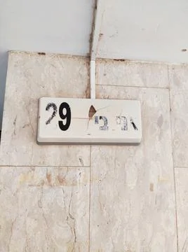 Plaque on the wall of the house with the number 29 Stock-Fotos